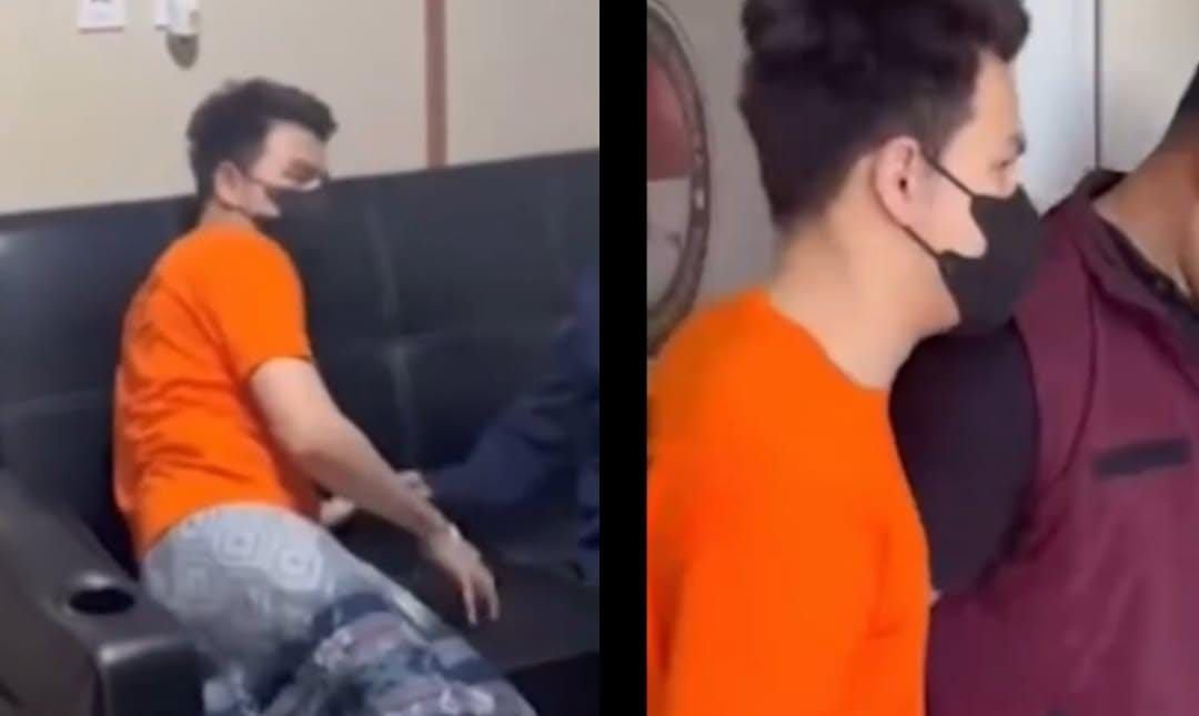 Potret Jonathan Frizzy Jadi Tersangka Kasus Vape Obat Keras, Kenakan Baju Oren dan Masker Hitam