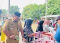 Suasana bazar Ramadan di Kecamatan Pulomerak, kemarin.