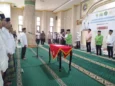Ketua Pengurus Wilayah DMI Provinsi Banten KH. Bunyamin Hafidz melantik Pengurus DMI Kota Serang periode 2025-2031 di Masjid Al Madani, Puspemkot Serang, Jumat 27 Februari 2026. (Harir Baldan/Bantenraya.com)